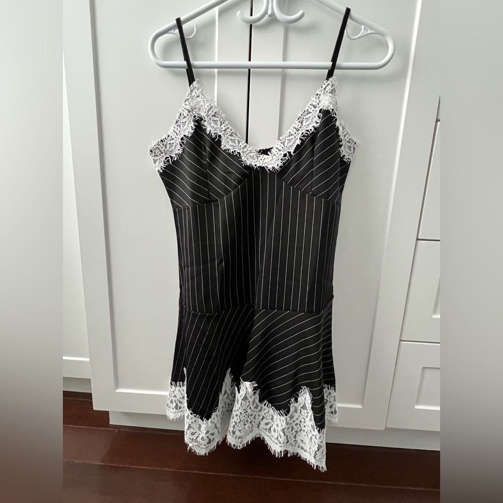 Black pinstripe and lace dress and jacket